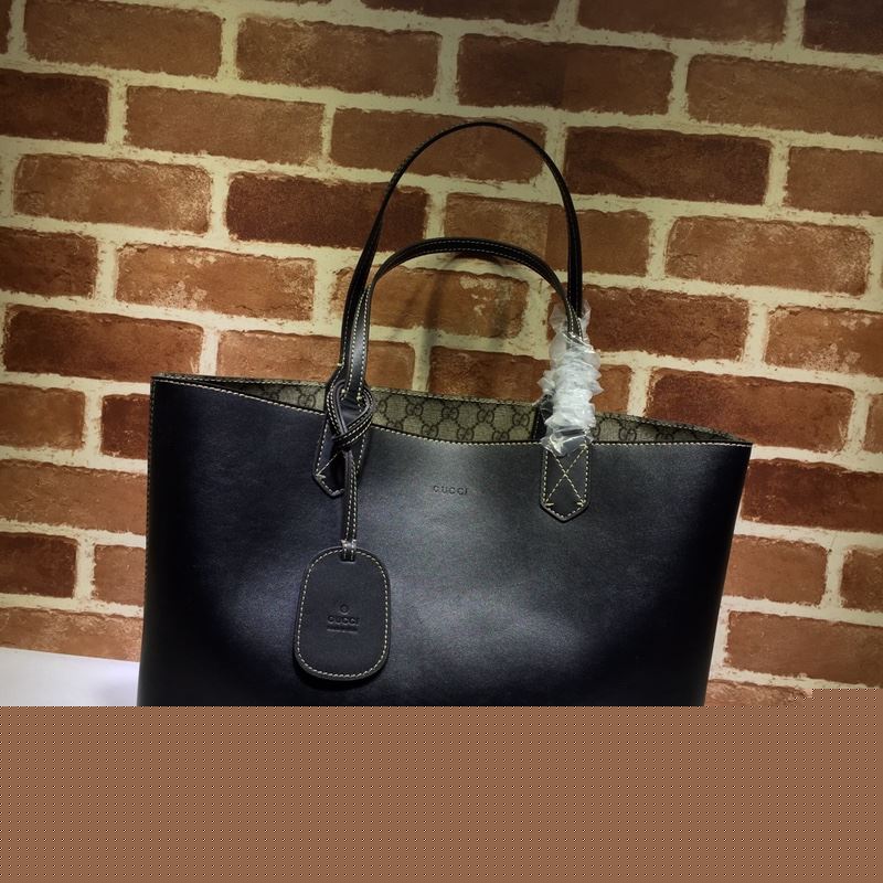 G*u*i shopping bags